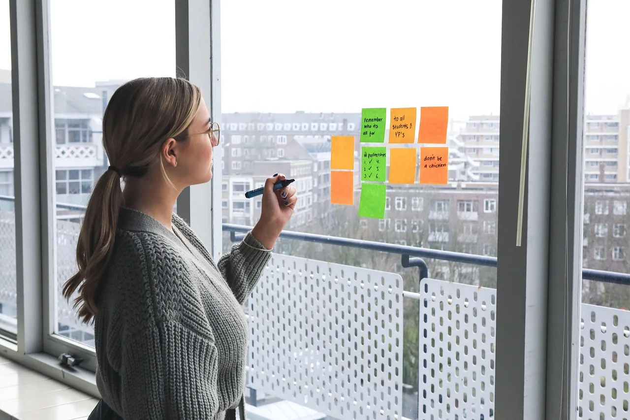 woman, office, notes, window, presentation, person, meeting, session, business, team, girl, teamwork, communication, network, marketing, entrepreneur, connection, idea, strategy, company, firm, young. Building an email campaign planning process with fewer moving parts